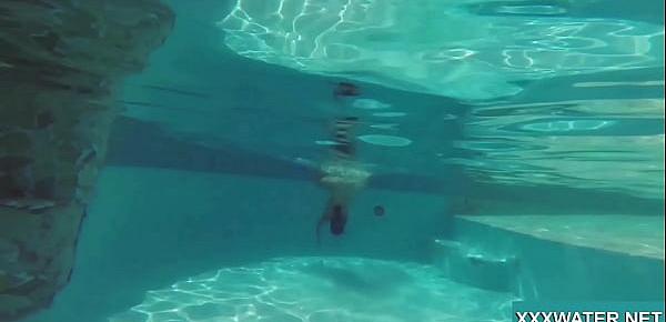  Hot brunette slut Candy swims underwater